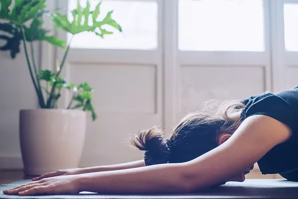 Canva - Woman Doing Yoga at Home